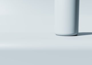 abstract image of a white cylindrical object on a neutral background